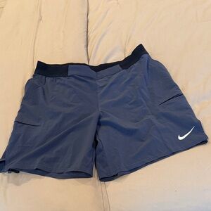 Nike Navy and Black Performance Shorts with White Swoosh